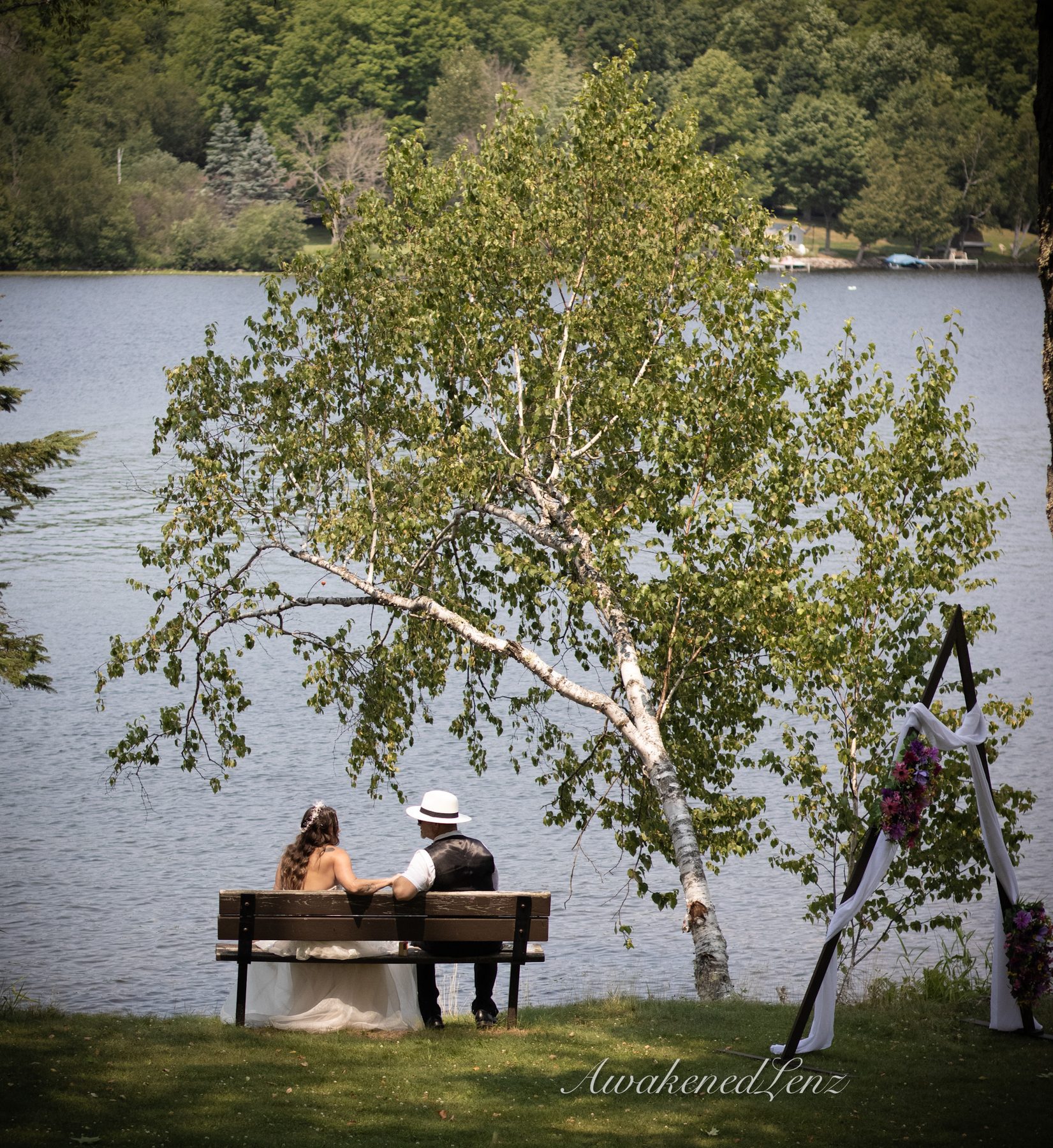 A lakeside wedding ceremony, frame 1 of 33