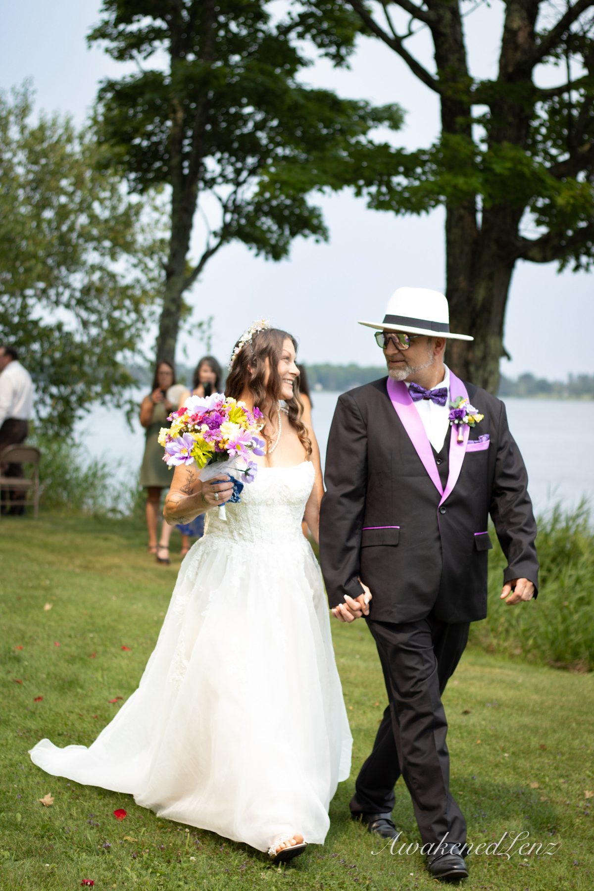 A lakeside wedding ceremony, frame 9 of 33