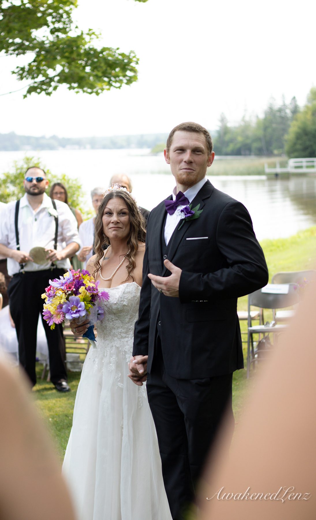 A lakeside wedding ceremony, frame 21 of 33