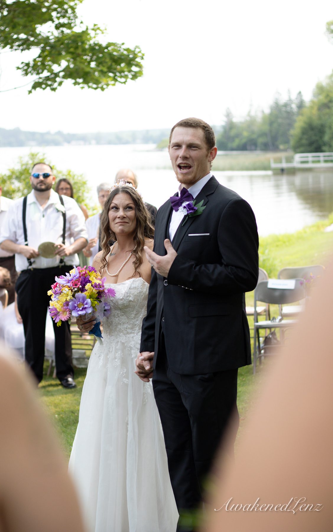 A lakeside wedding ceremony, frame 22 of 33