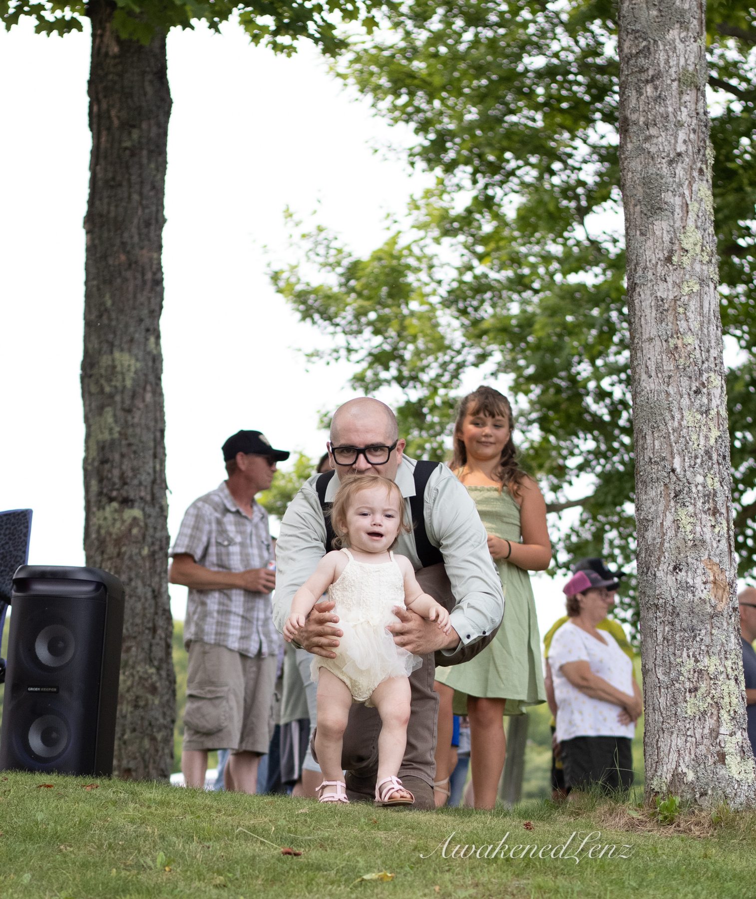 A lakeside wedding ceremony, frame 27 of 33