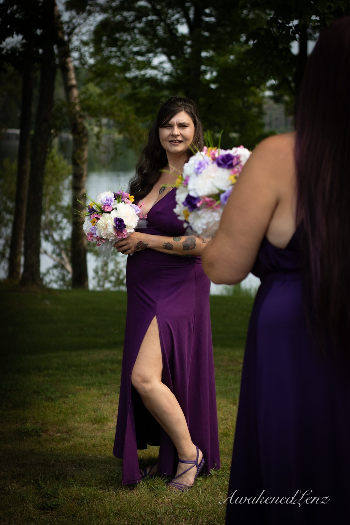 A bride and her party getting ready before a lakeside wedding, frame 1 of 16