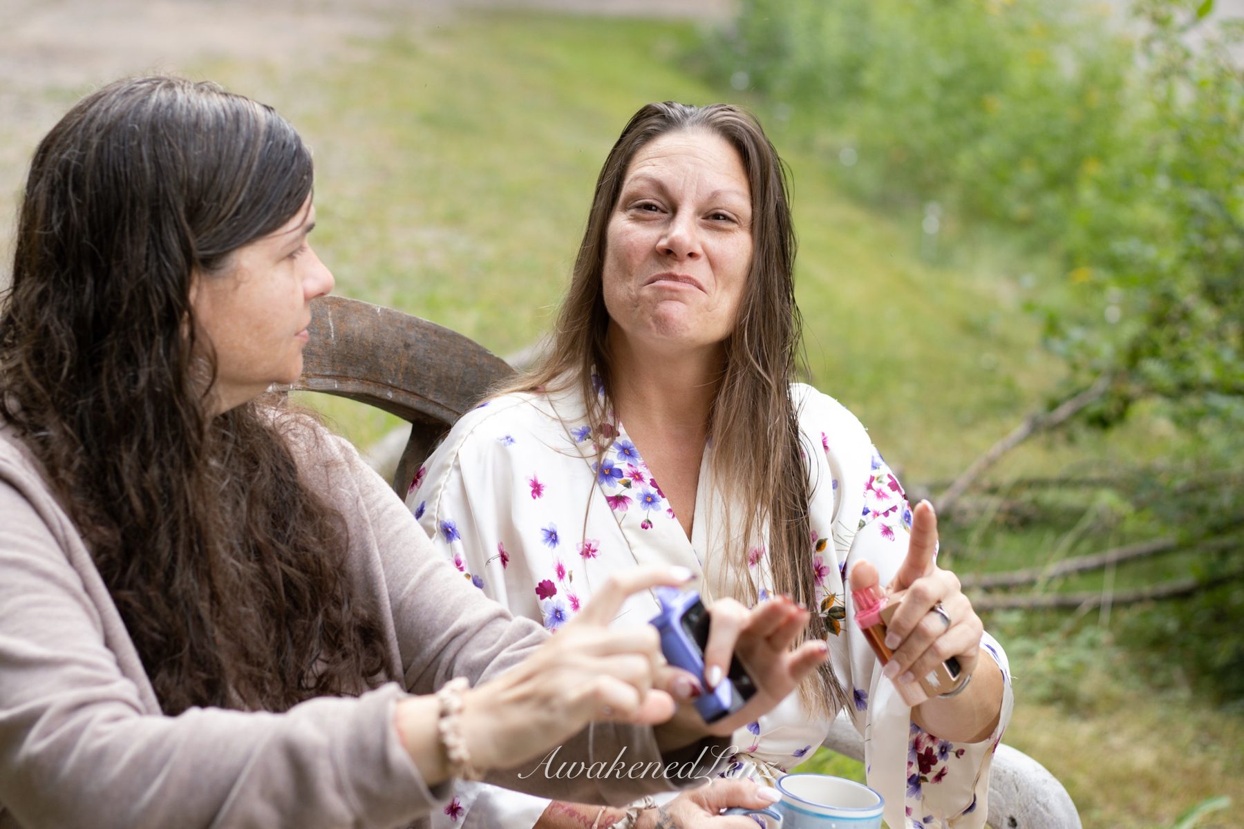 A bride and her party getting ready before a lakeside wedding, frame 14 of 16