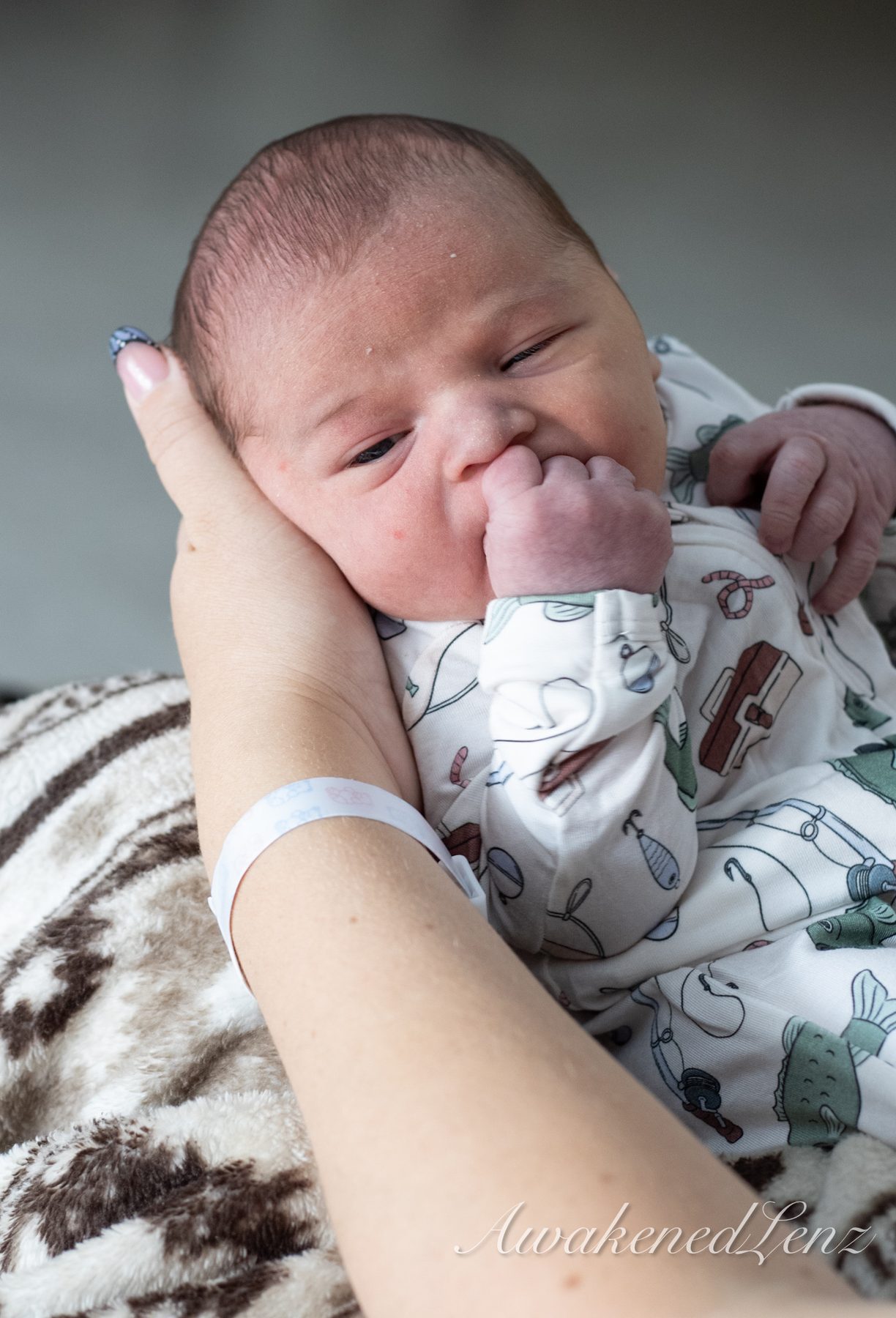 A newborn in the first days after birth, frame 7 of 72