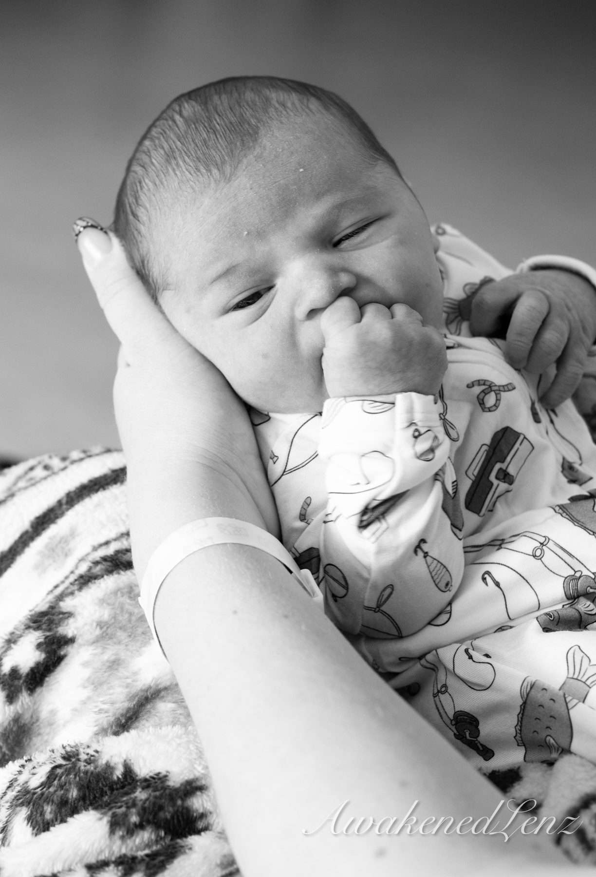 A newborn in the first days after birth, frame 8 of 72