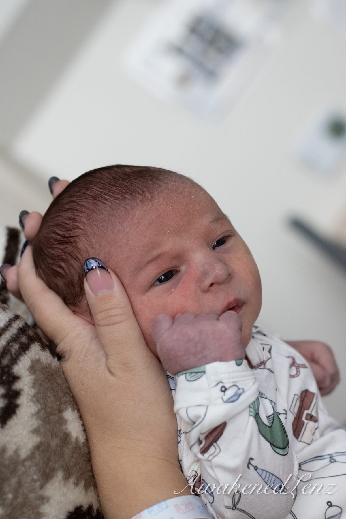 A newborn in the first days after birth, frame 10 of 72