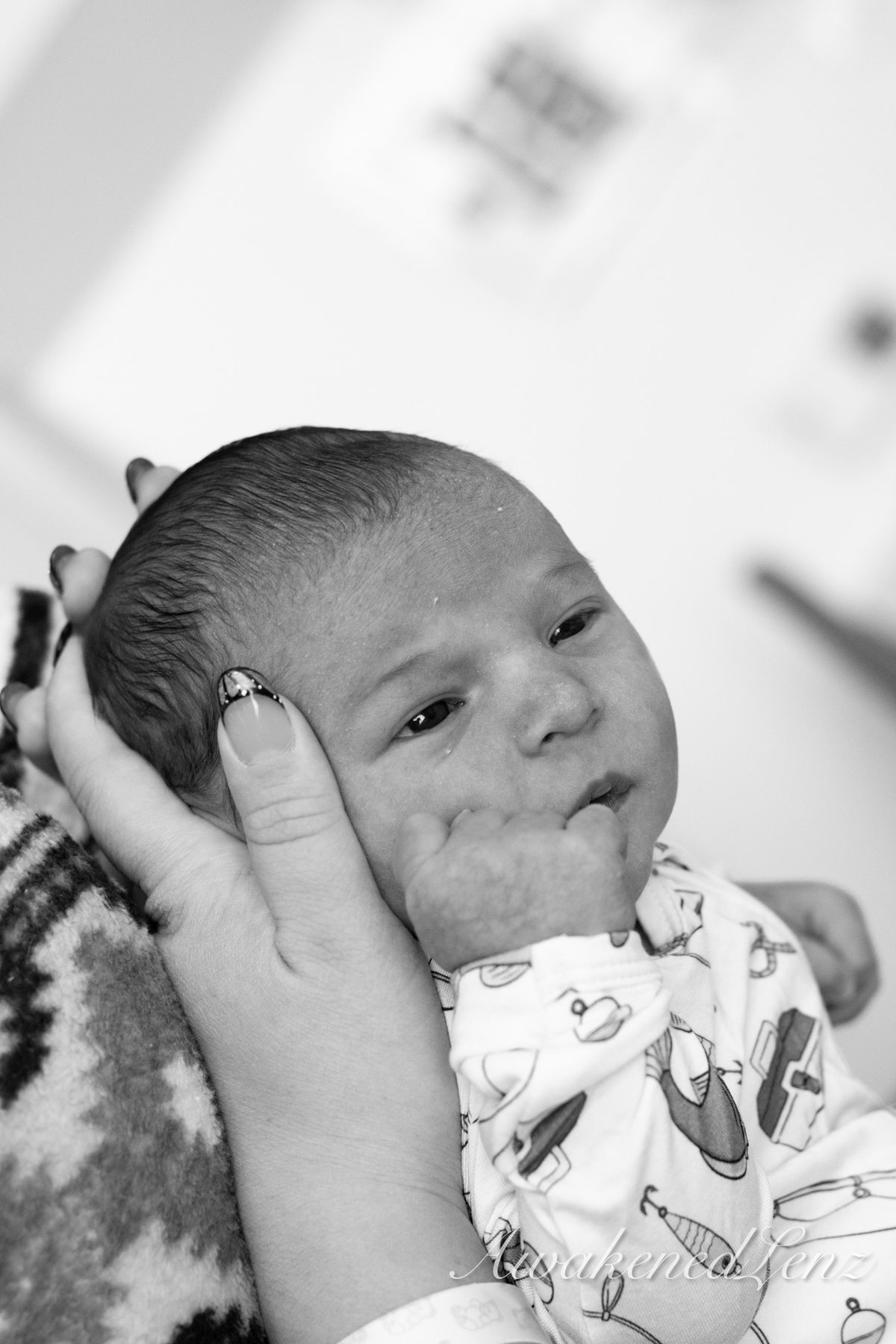 A newborn in the first days after birth, frame 11 of 72
