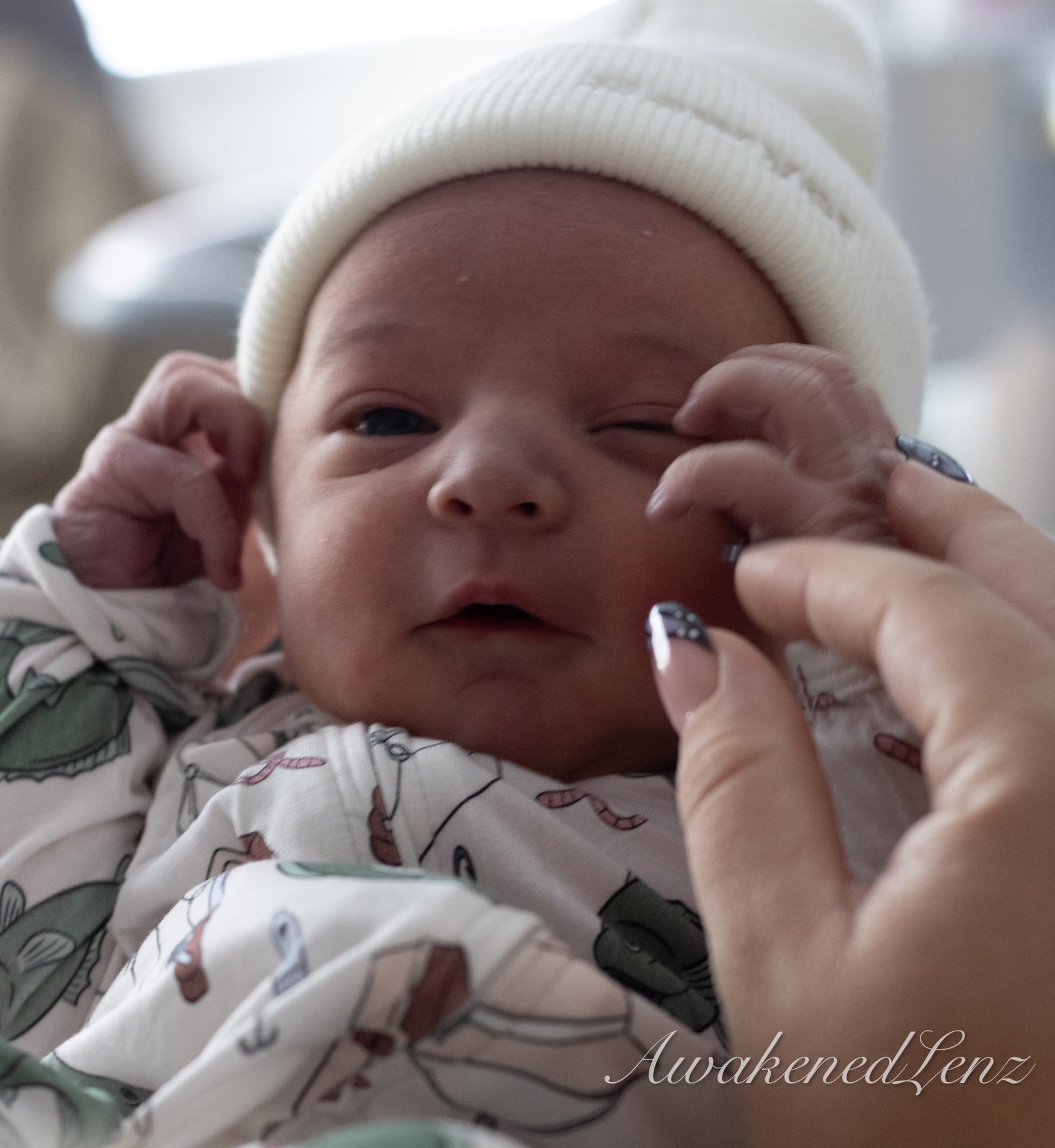 A newborn in the first days after birth, frame 13 of 72