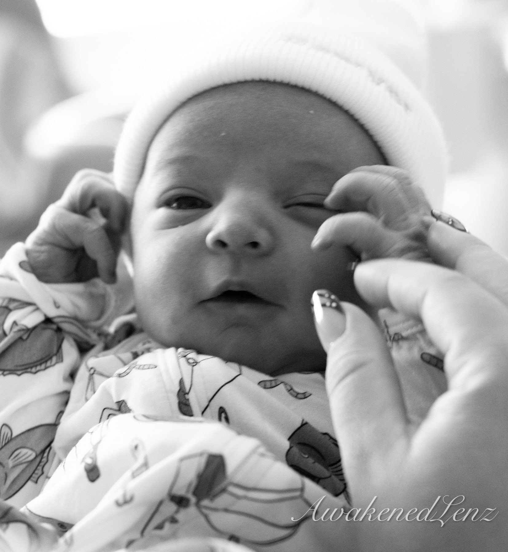 A newborn in the first days after birth, frame 14 of 72