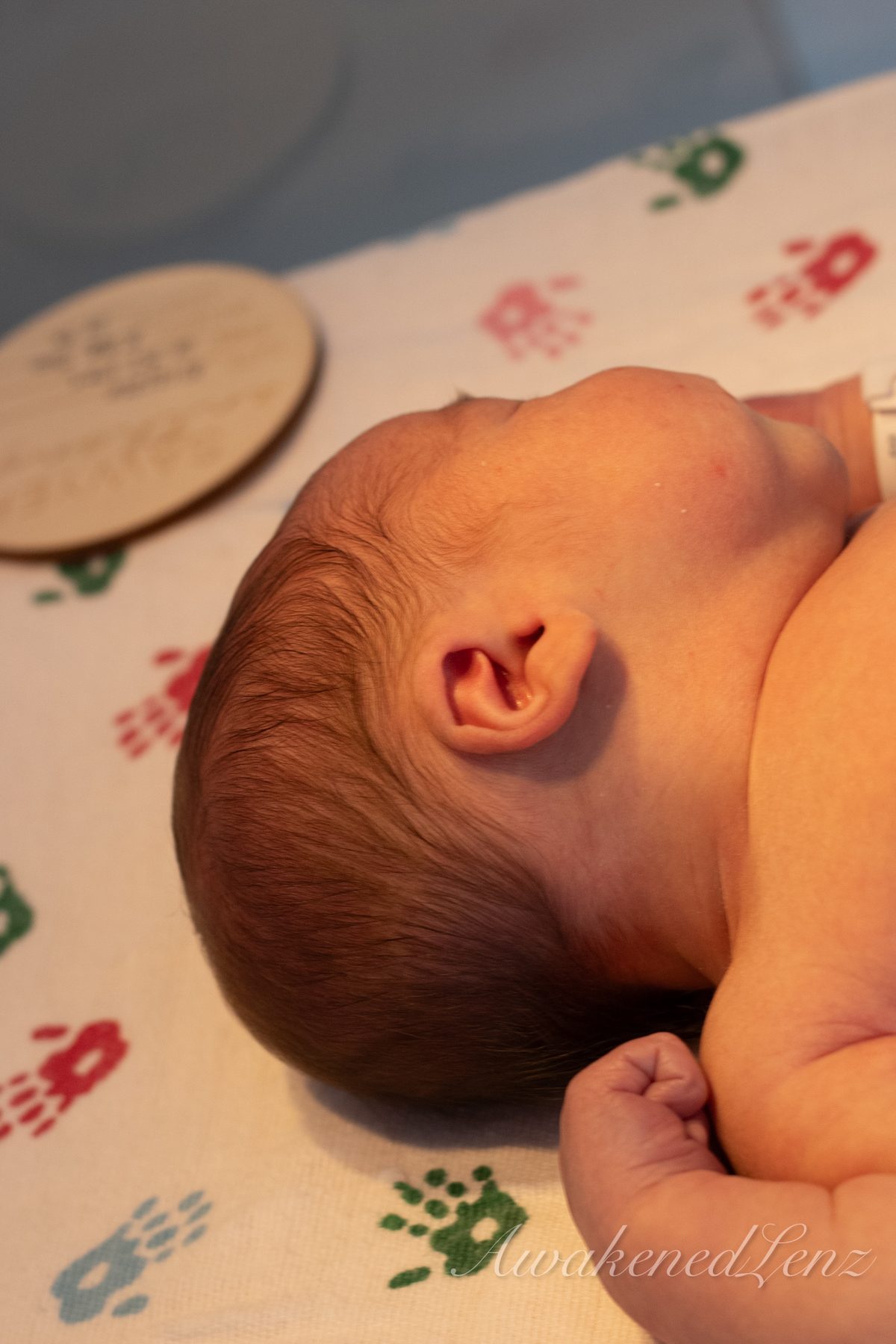 A newborn in the first days after birth, frame 41 of 72