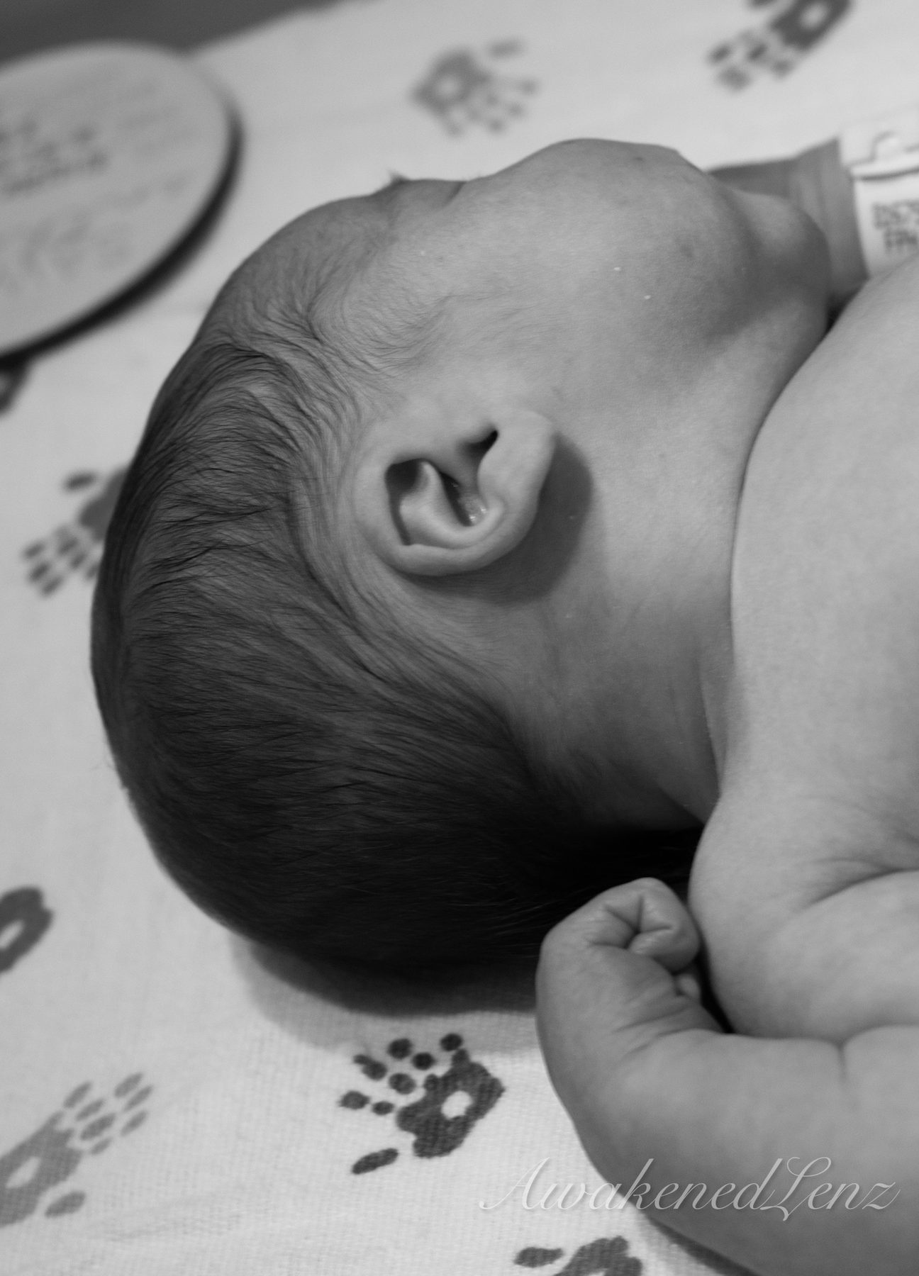 A newborn in the first days after birth, frame 42 of 72