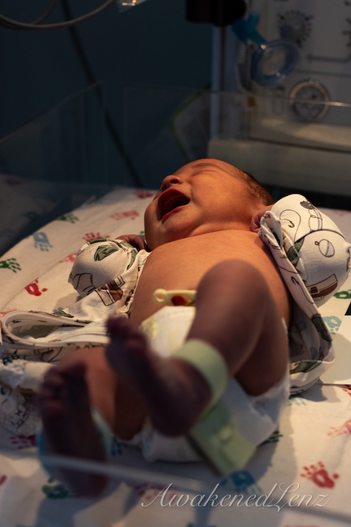 A newborn in the first days after birth, frame 66 of 72