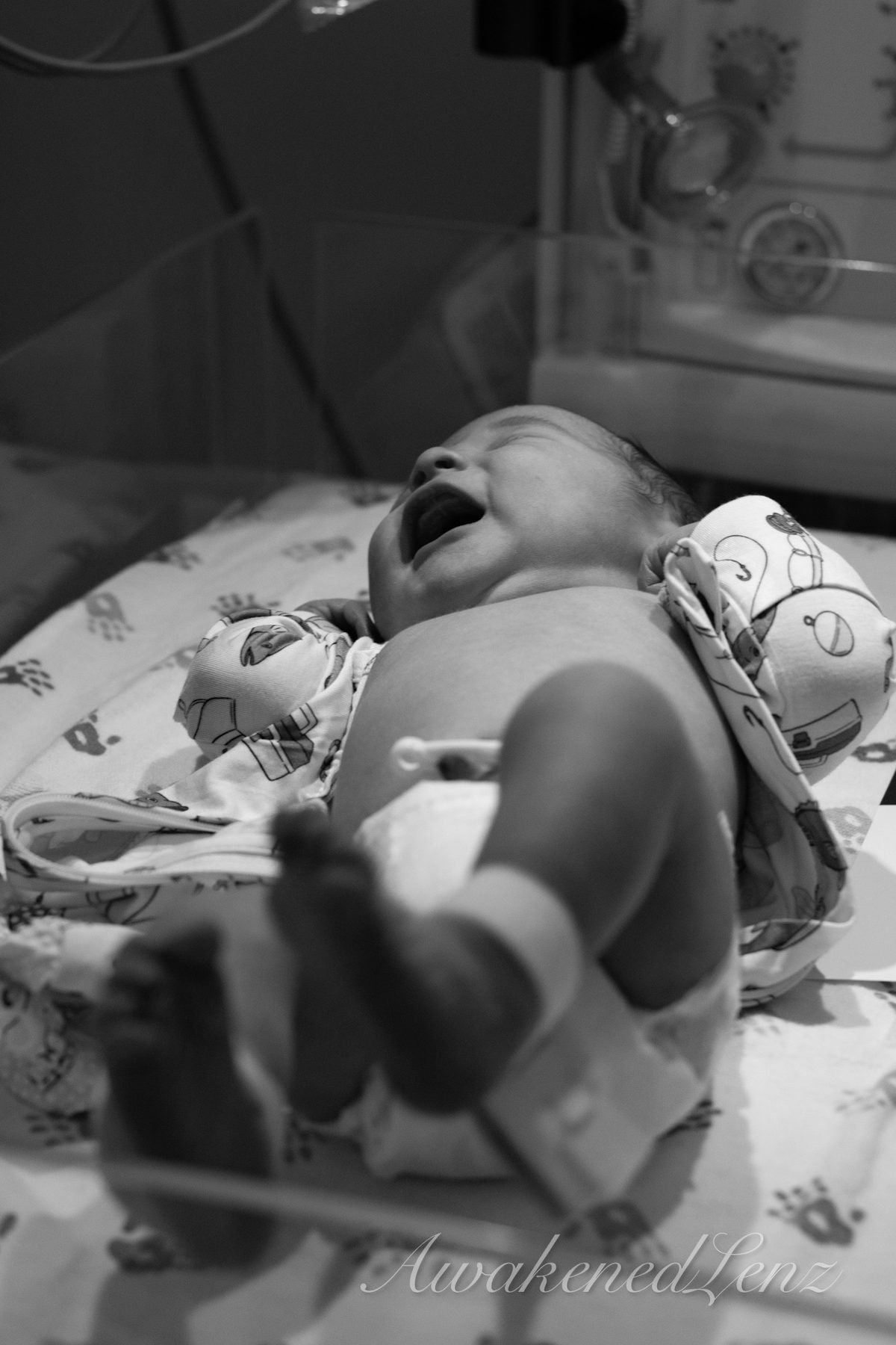 A newborn in the first days after birth, frame 67 of 72